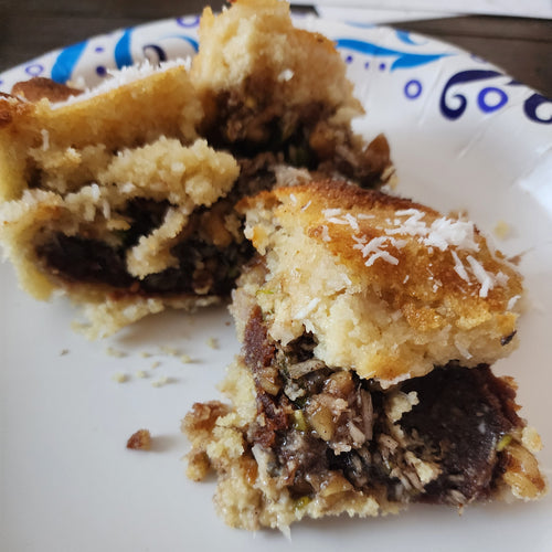 Honey cake stuffed with dates and nuts